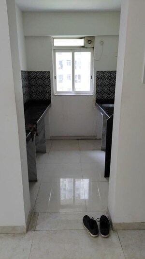 Kitchen in 1 BHK Apartment at Lodha Amara, Kolshet Road – for Sale