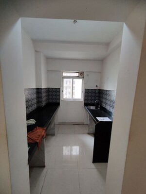 Kitchen in 1 BHK Apartment at Lodha Amara, Kolshet Road – for Sale