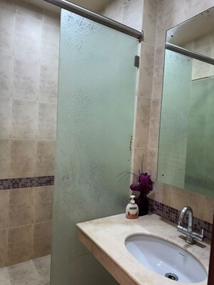 Bathroom in 3 BHK Apartment at Oberoi Springs, Andheri West – for Rent