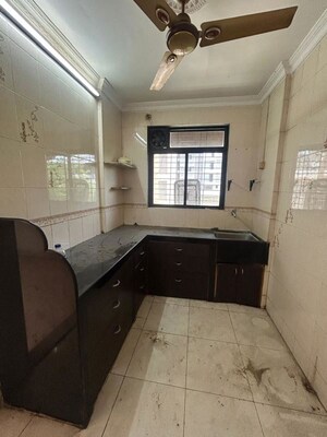 Kitchen in 1 BHK Apartment at Guru Sankalp CHS, New Panvel – for Rent