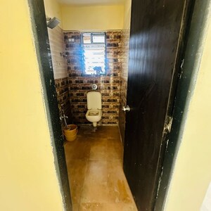 Building Lobby in 2 BHK Apartment at Shraddha Evoque, Sonapur – for Rent