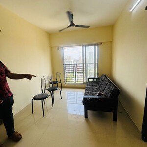 Living Room in 2 BHK Apartment at Shraddha Evoque, Sonapur – for Rent