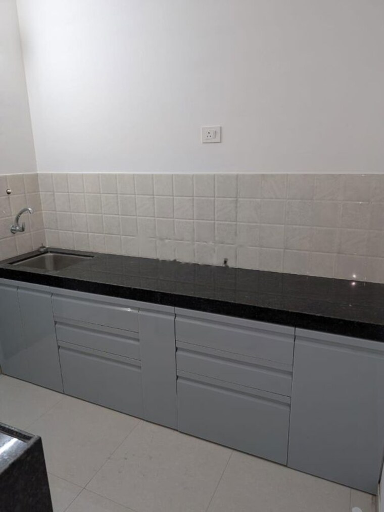 Kitchen, shapoorji-pallonji-joyville-hadapsar-annexe 3 Bedroom 1100 Sq.Ft. Apartment In Hadapsar Pune 10457515