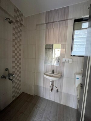 Bathroom in 2 BHK Apartment at Austin Arena, Tathawade – for Rent