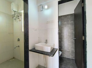 Bathroom in 1 BHK Apartment at Mantra Insignia, Mundhwa – for Rent