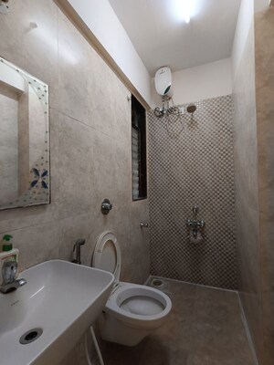 Bathroom in 2 BHK Apartment at Asmita Sand Dunes, Malad West – for Rent