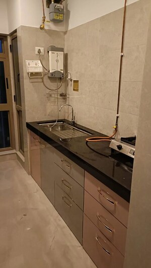 Kitchen in 2 BHK Apartment at Sheth Vasant Oasis, Andheri East – for Rent