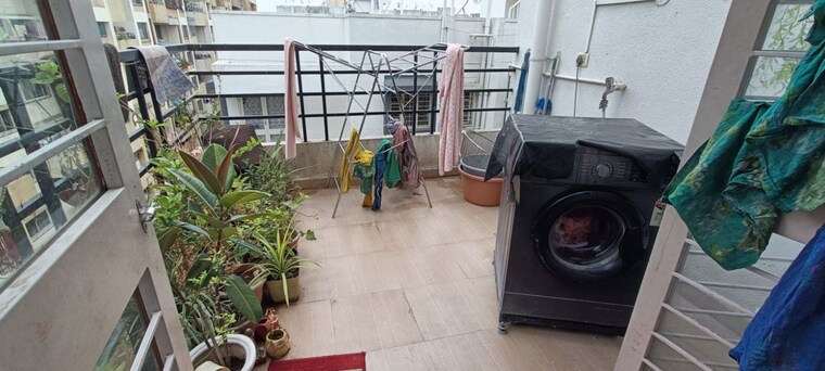 Balcony, bramha-residency 1.5 Bedroom 580 Sq.Ft. Apartment In Thergaon Pune 10457570