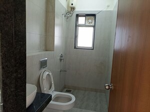 Bathroom in 3 BHK Apartment at Roodraksh Golf Walk, Chembur – for Rent