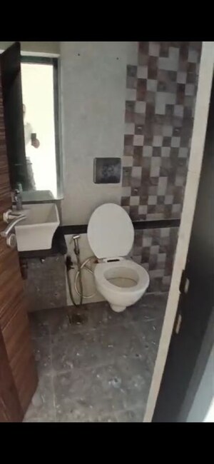 Bathroom in 2 BHK Apartment at Poddar Shri Ganesh Apartment, Goregaon West – for Rent