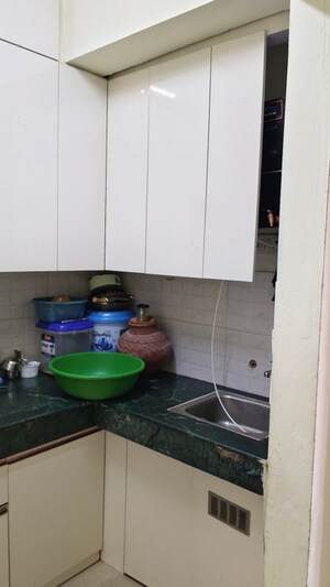 Kitchen in 1 BHK Apartment at Shree Vardhman Green Court, Sector 90 – for Rent