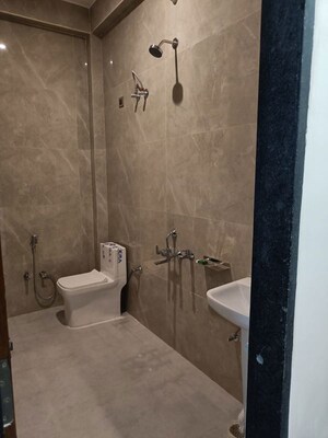 Bathroom in 3.5 BHK Apartment at Rishita Mulberry Heights, Sushant Golf City – for Rent