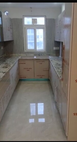 Kitchen in 4 BHK Apartment at Ark Vrinda City, Raj Nagar Extension – for Rent