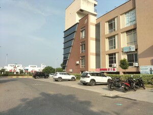  Office Space – Exterior View View at Ansal API Shopping Square, Sushant Golf City - for Rent