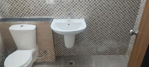 Bathroom in 2 BHK Apartment at Shri Radha Sky Gardens, Sector 16b Greater Noida – for Rent