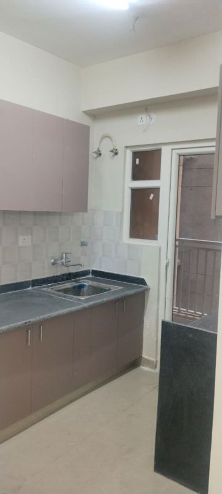 Kitchen, shri-radha-sky-gardens 2 Bedroom 1200 Sq.Ft. Apartment In Sector 16b Greater Noida Greater Noida 10457866