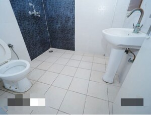 Bathroom in 2 BHK Apartment at Panchsheel Wellington, Dundahera – for Sale
