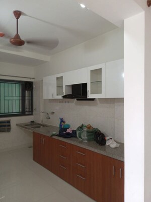 Kitchen in 2 BHK Apartment at Kumar Palmspring Towers, Undri – for Rent