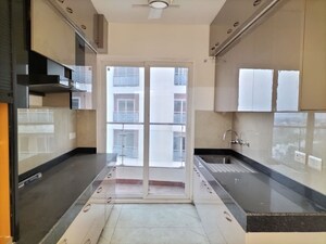 Kitchen in 2 BHK Apartment at Rishita Mulberry Heights, Sushant Golf City – for Rent