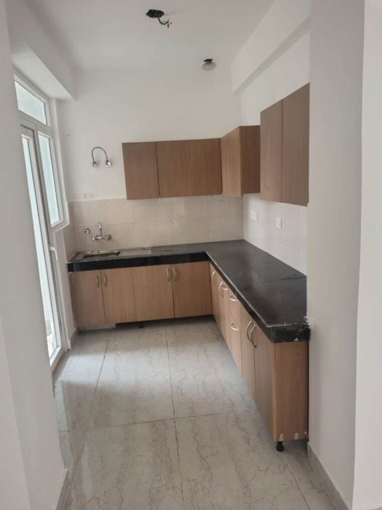 Kitchen, amrapali-zodiac 2.5 Bedroom 1075 Sq.Ft. Apartment In Sector 120 Noida 10458195