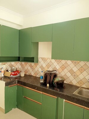 Kitchen in 2 BHK Apartment at Nilaya Greens, Raj Nagar Extension – for Rent