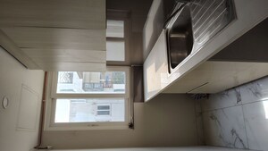 Kitchen in 2.5 BHK Builder Floor at Central Park Flower Valley, Sohna Sector 33 – for Rent