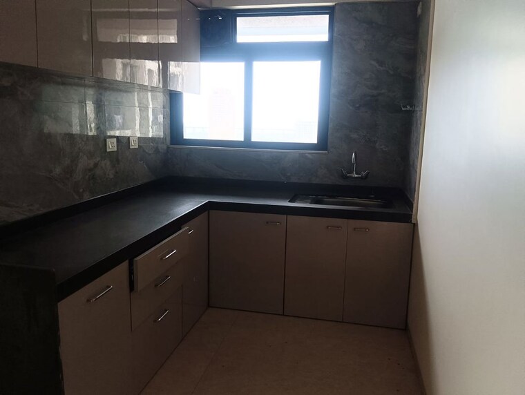 Kitchen, dosti-eastern-bay 2 Bedroom 559 Sq.Mt. Apartment In Wadala Mumbai 10458376