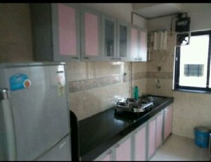 Kitchen in 1 BHK Apartment at K Rahega Palm Springs, Malad West – for Rent