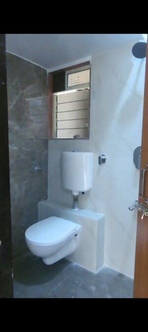 Bathroom in 1 BHK Apartment at Malhar Chhaya Central Greens, Pisawali N V – for Sale