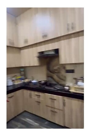 Kitchen in 3 BHK Builder Floor at Mansarover Garden – for Sale