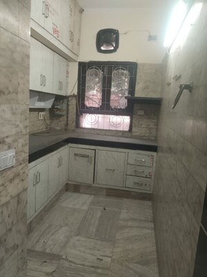 Kitchen in 2.5 BHK Builder Floor at Chittaranjan Park – for Sale