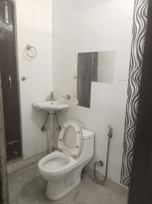 Bathroom in 2.5 BHK Builder Floor at Chittaranjan Park – for Sale