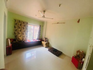 Living Room in 1 BHK Apartment at Royal Palms, Goregaon East – for Sale
