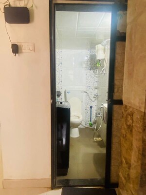 Bathroom in 1 BHK Apartment at Royal Palms, Goregaon East – for Sale
