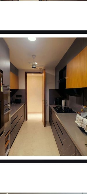 Kitchen in 2 BHK Apartment at Oberoi Maxima, Andheri East – for Rent