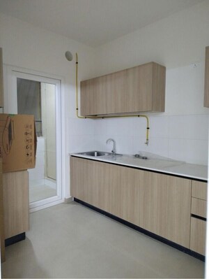Kitchen in 2 BHK Apartment at Bhartiya City Nikoo Homes 4, Thanisandra Main Road – for Rent