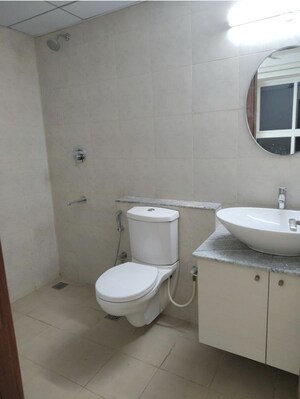 Bathroom in 2 BHK Apartment at Bhartiya City Nikoo Homes 4, Thanisandra Main Road – for Rent