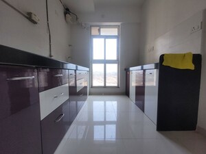 Kitchen in 2 BHK Apartment at Godrej Emerald, Ghodbunder Road – for Rent