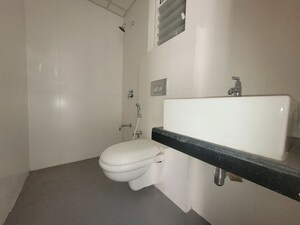 Bathroom in 2 BHK Apartment at Godrej Emerald, Ghodbunder Road – for Rent