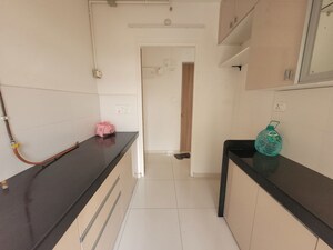Kitchen in 1.5 BHK Apartment at Godrej Emerald, Ghodbunder Road – for Rent