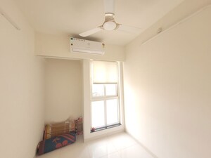 Room in 1.5 BHK Apartment at Godrej Emerald, Ghodbunder Road – for Rent