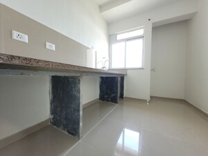 Kitchen in 2 BHK Apartment at Puranik City Reserva, Ghodbunder Road – for Rent