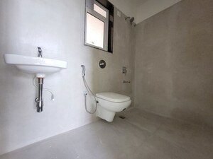 Bathroom in 2 BHK Apartment at Puranik City Reserva, Ghodbunder Road – for Rent