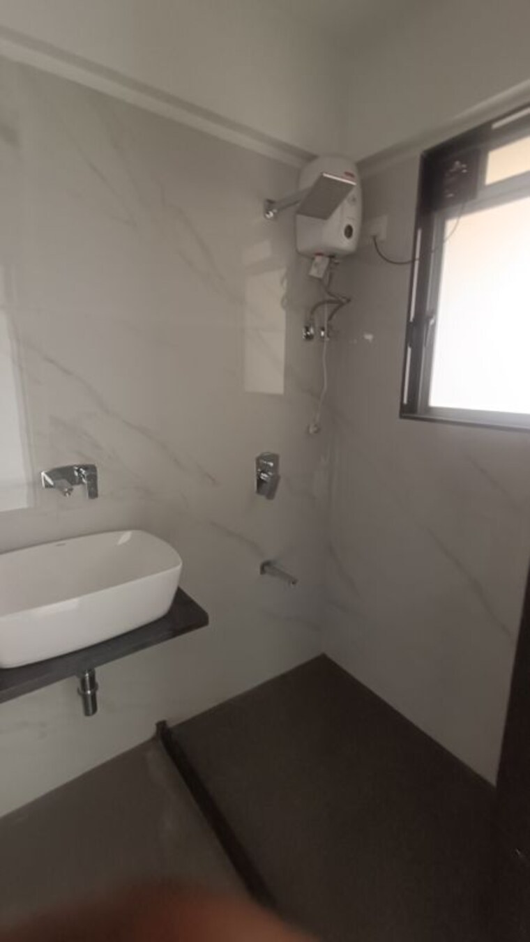 Bathroom, khodiyaar-siddharth-nagar-goodwill-chs 2 Bedroom 728 Sq.Ft. Apartment In Goregaon West Mumbai 10458724