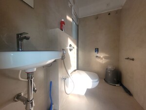 Bathroom in 1 BHK Apartment at Puraniks City Reserva, Ghodbunder Road – for Rent
