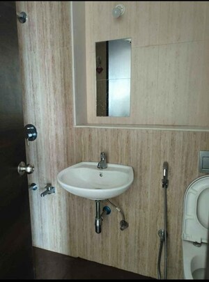 Bathroom in 2 BHK Apartment at Lodha Downtown, Dombivli East – for Rent