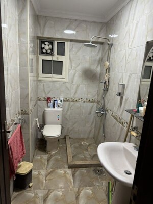 Bathroom in 3 BHK Apartment at Raja Park – for Rent