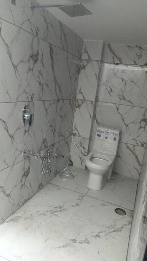 Bathroom in 3 BHK Apartment at Raja Park – for Rent