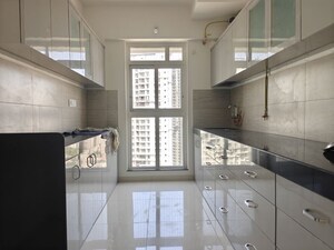 Kitchen in 3 BHK Apartment at Godrej Emerald, Ghodbunder Road – for Rent