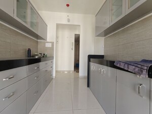 Kitchen in 3 BHK Apartment at Godrej Emerald, Ghodbunder Road – for Rent